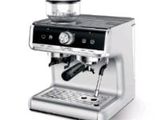 an image of a coffee machine with a cup on top of it