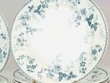 many plates stacked on top of each other on a table