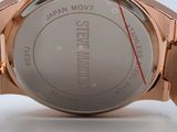 an image of a close up of a watch on a white surface