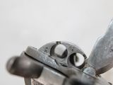 a close up of a gun that is on a table