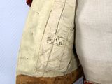 a close up of a jacket on a mannequin mannequin