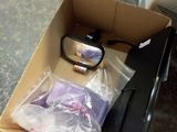a box with a phone and a pair of glasses in it