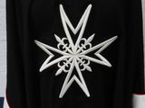 a picture of a black shirt with a snowflake on it