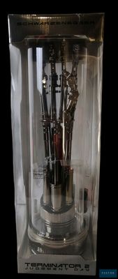 a clock inside of a glass case with a bunch of flowers inside of it