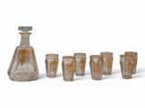 set of six glasses and a decanter with a decanter in the middle