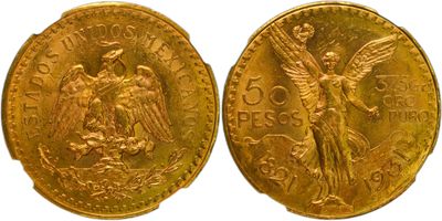 a close up of two gold coins with angels on them