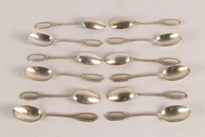 a lot of spoons that are sitting on a table