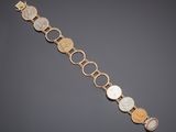 a gold and mother of pearl bracelet