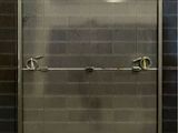 an image of a bathroom with a shower and a toilet