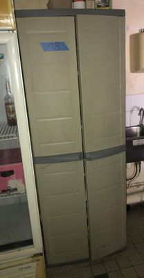 a refrigerator in a kitchen with a refrigerator door open