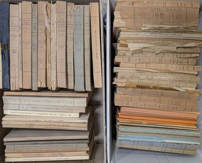 two bins full of old books on a shelf