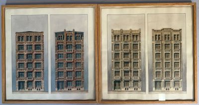 two framed pictures of a building on the wall