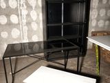 two tables and a bench in a room