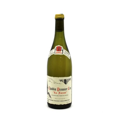 a bottle of wine that is sitting on a table