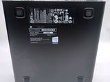 the back of a black battery box with a white background