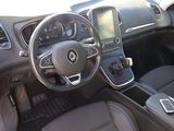 the interior of a car with a steering wheel, dashboard, and dash board