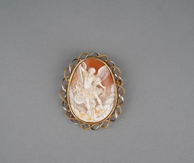 an image of a gold and white cameo broochle with angels