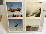 a picture of a picture of a helicopter flying over the water