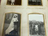an old photo of a group of people posing for a picture in a book