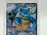 a close up of a pokemon card in a plastic case