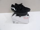 vans old skooler black and white sneakers on a box