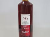 a bottle of wine that is sitting on a table