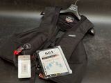 an image of a luggage bag with a tag attached to it