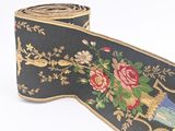a black ribbon with a floral design on it