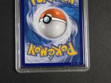 pokemon trading card with a poke ball in the middle of it