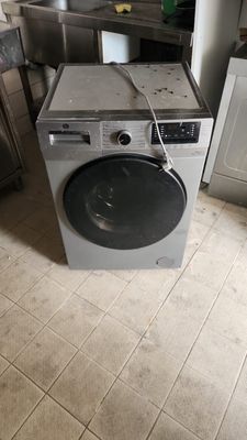 a washer and dryer sitting in a kitchen