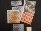 a group of four different postage stamps on top of each other