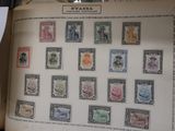 a book with stamps on it sitting on a table