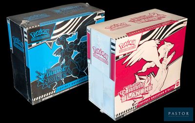 two boxes that are sitting side by side on a black background