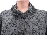 a close up of a dress on a mannequin dummy