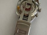 an image of a watch on a table with a price tag