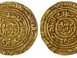 deux pièces d'or, dont l'une présente un motif circulaire et l'autre un motif circulaire