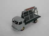 a toy truck that is sitting on a white surface