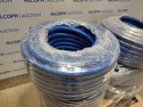 several blue and white hoses are stacked on top of each other