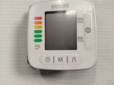 a close up of a white electronic device on a table