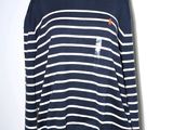navy blue and white striped sweater with orange patch on chest