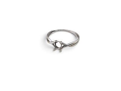 an image of a silver ring on a white background