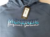 a close up of a blue hoodie with a tag on it