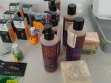 many different types of hair products on the table