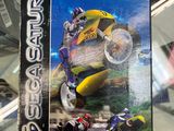 La boîte du jeu « Manx T Super Bike » est posée sur une table en verre.