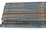 six books of french literature are stacked on top of each other