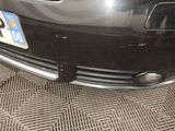 a close up of a car with a number plate on it