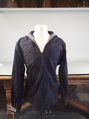 a mannequin with a sailor ' s uniform on it