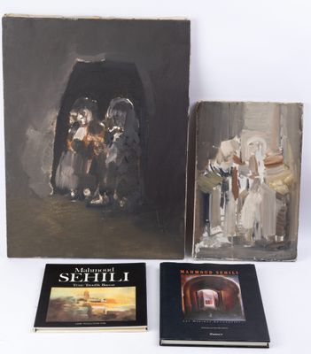 three books on a table with pictures of people in a cave