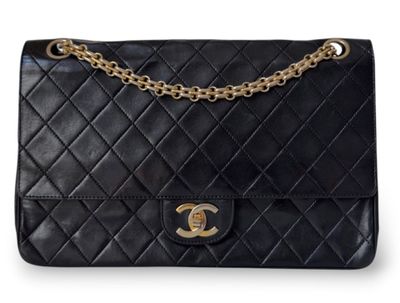 a chanel black quilted leather shoulder bag with gold hardware
