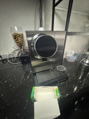 a machine that is sitting on a counter in a kitchen